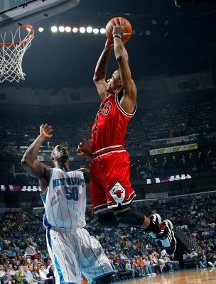 derrick rose dunking on someone. hot Derrick Rose of the