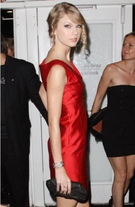 taylor swift red dresses. Taylor Swift wearing a